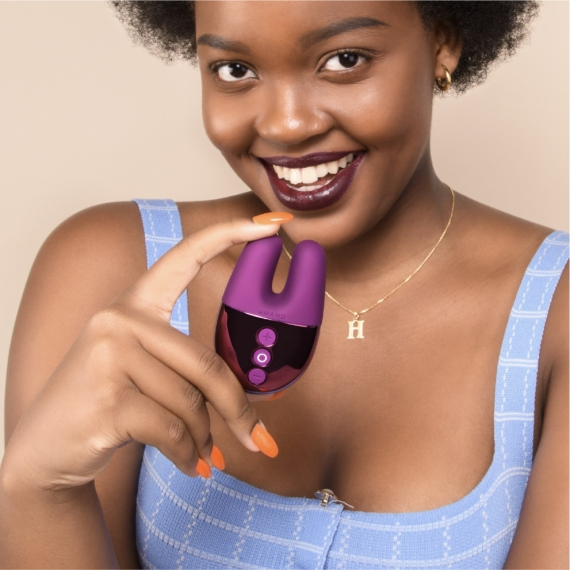 Dark cherry rechargeable rabbit vibrator with dual motors and intuitive controls.