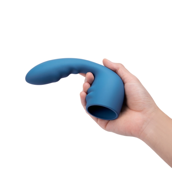 A blue silicone wand attachment is held in a hand.