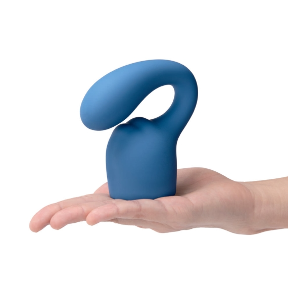 Blue silicone G-spot and clitoral attachment on a hand.