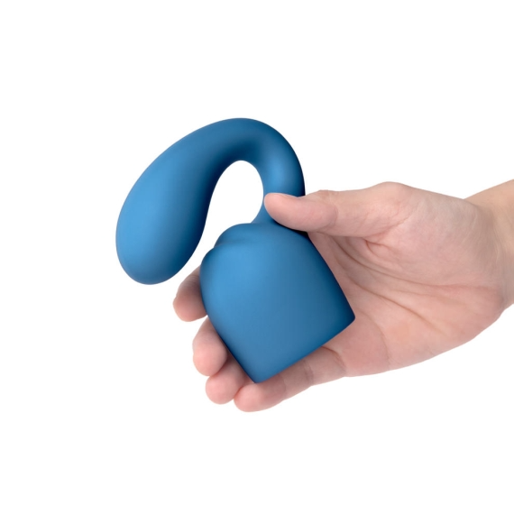 Blue silicone G-spot and clitoral attachment held in a hand.