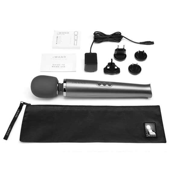 Rechargeable wand massager with charging accessories and travel case.