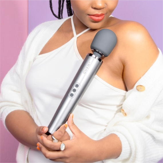 A silver rechargeable wand massager with a grey head.