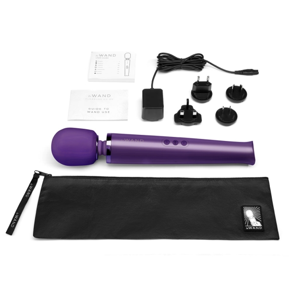 Purple rechargeable wand massager with accessories and storage pouch.