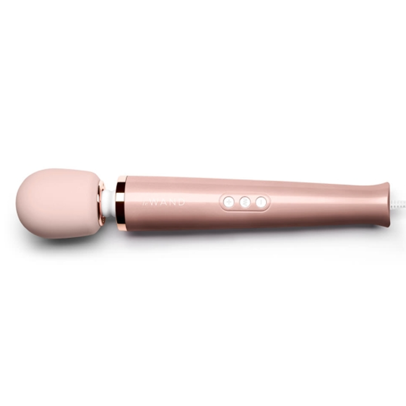 A rose gold wand massager with a silicone head and three control buttons.
