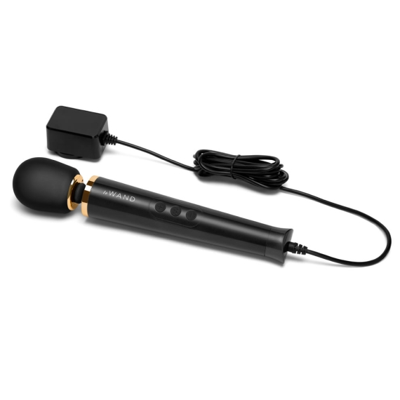 Black wand massager with gold accents and a charging cord.
