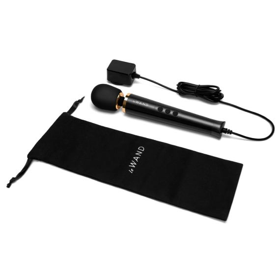 Black Le Wand massager with charger and storage bag.