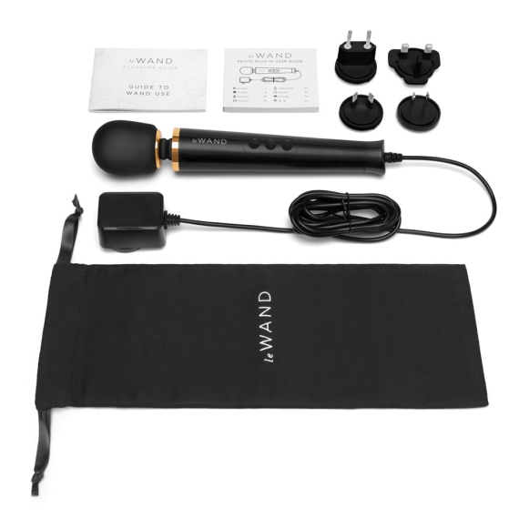 Black Le Wand petite plug-in wand massager with accessories and storage bag.
