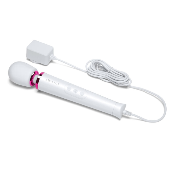 White wand massager with pink accents, a cord, and a power adapter.
