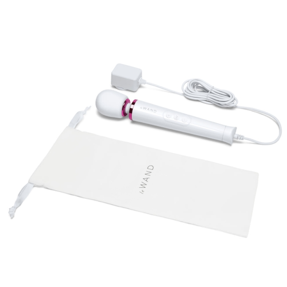 White wand massager with pink accents, charging cord, and storage bag.