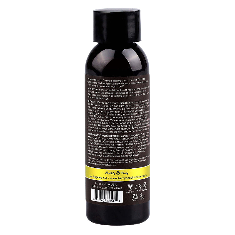A bottle of Earthly Body Beach Daze Hemp Seed Massage and Body Oil.
