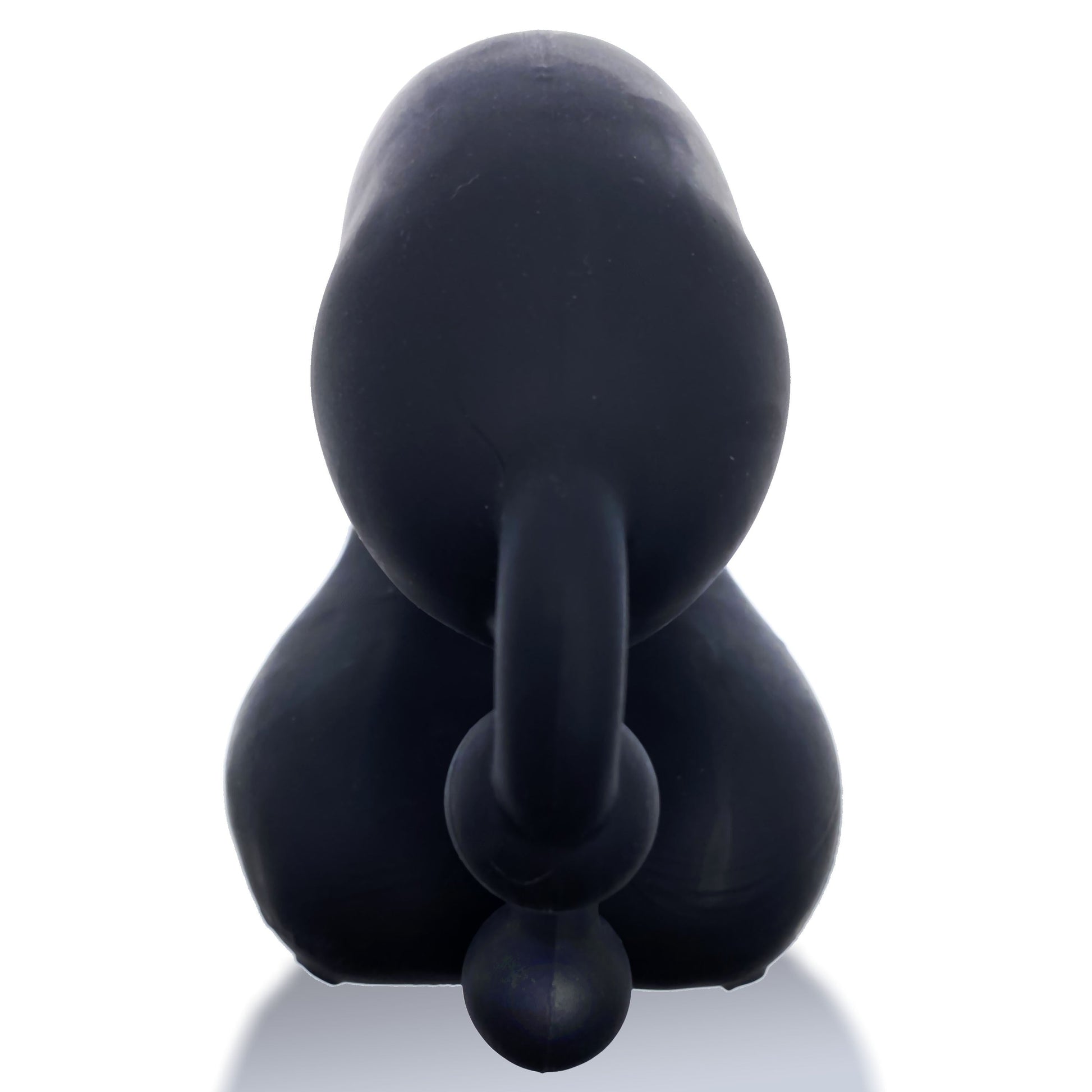 Black silicone chastity device with a rounded top and a curved appendage.