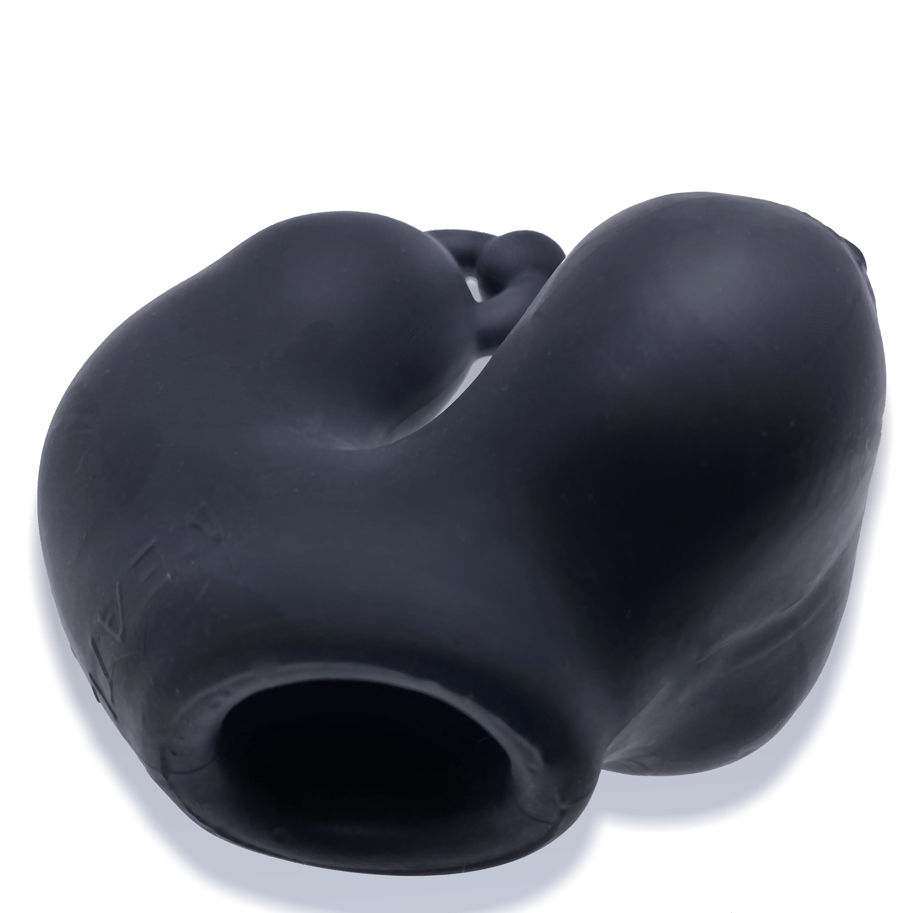 Black stretchy silicone chastity device with a curved shape.