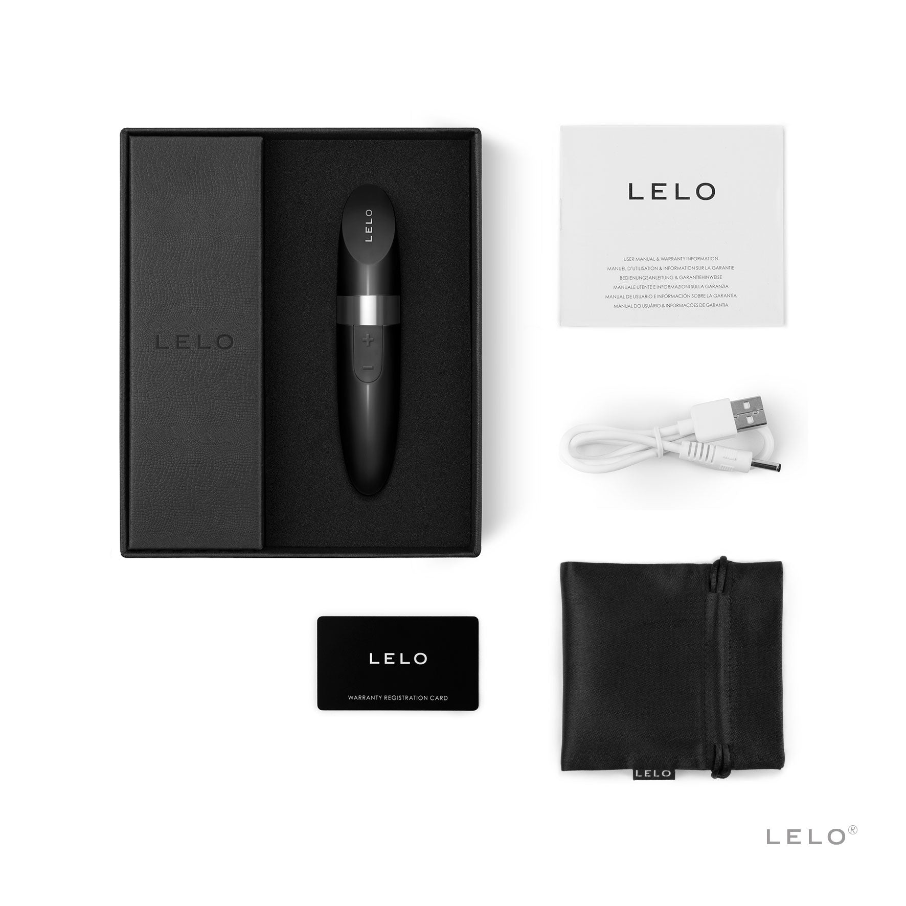 A black Lelo lipstick vibrator with charging cable, manual, and storage pouch.