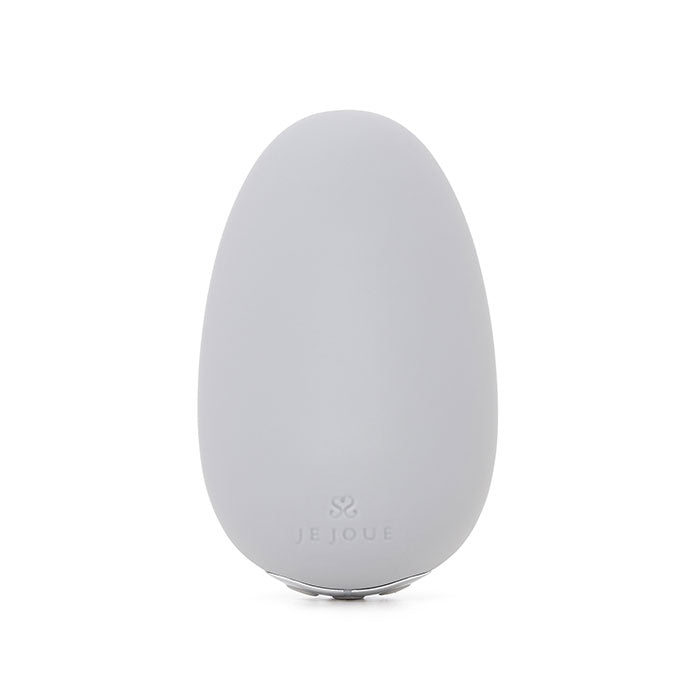 A light gray, egg-shaped clitoral vibrator with the Je Joue logo.