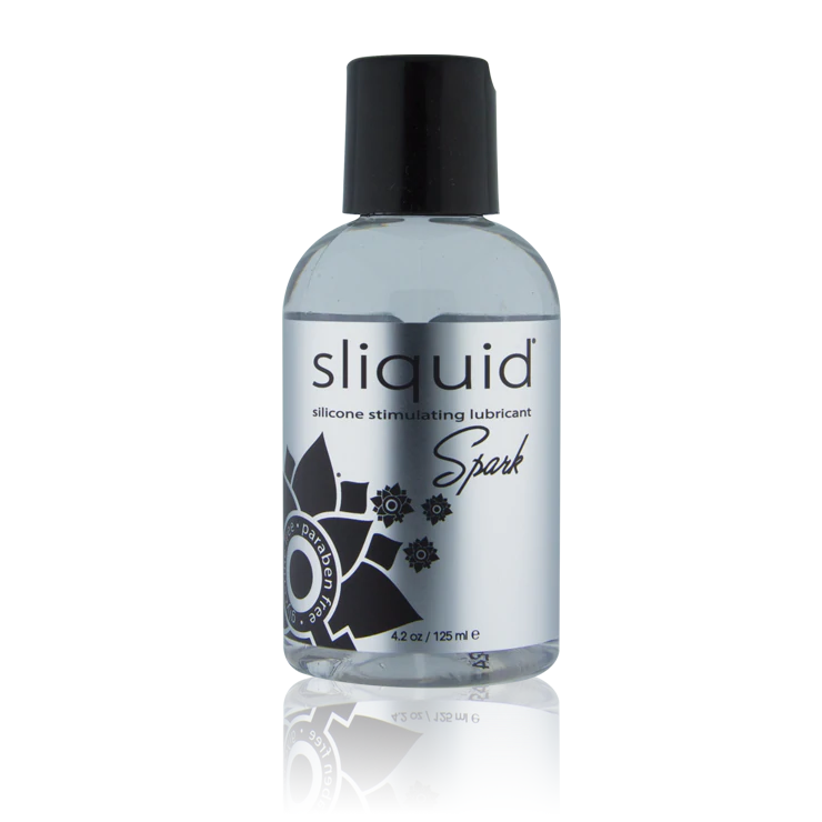 Sliquid Spark silicone lubricant with menthol infusion in a 4.2 oz bottle.
