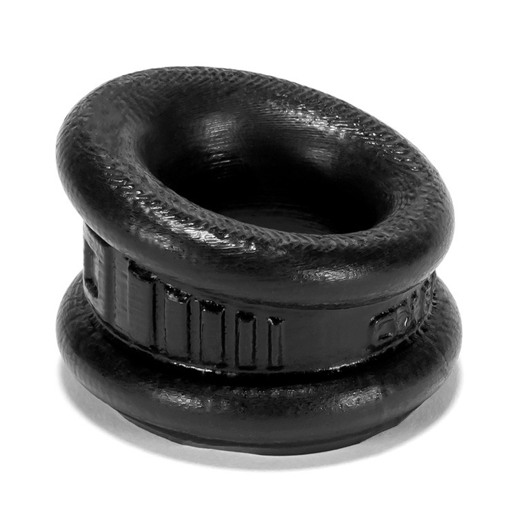 Black silicone ball stretcher and cock ring with an angled design.
