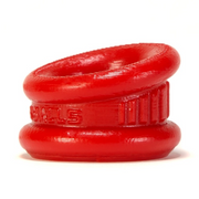 Red silicone ball stretcher with textured grip and angled opening.