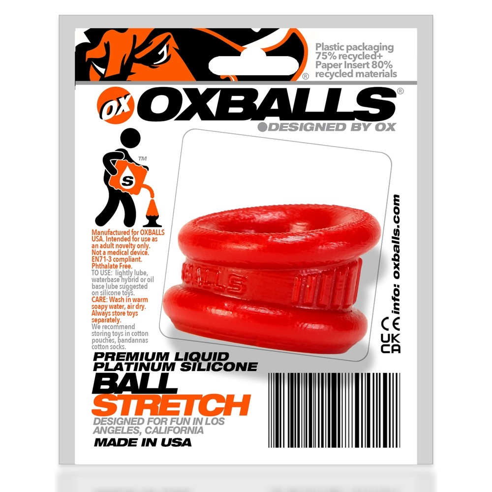 Red silicone ball stretcher and cock ring with "OXBALLS" branding.