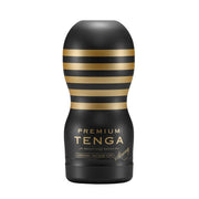 Tenga Premium Vacuum Cup male masturbator with gold stripes.