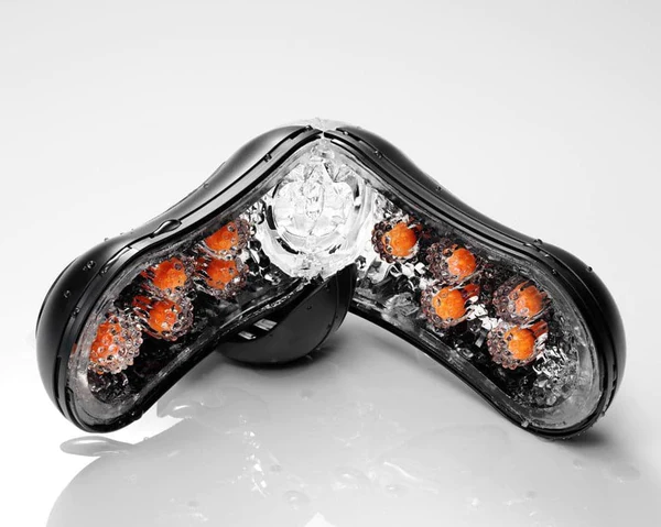 Tenga Flip Orb Strong Orange reusable waterproof stroker with internal orange orbs.