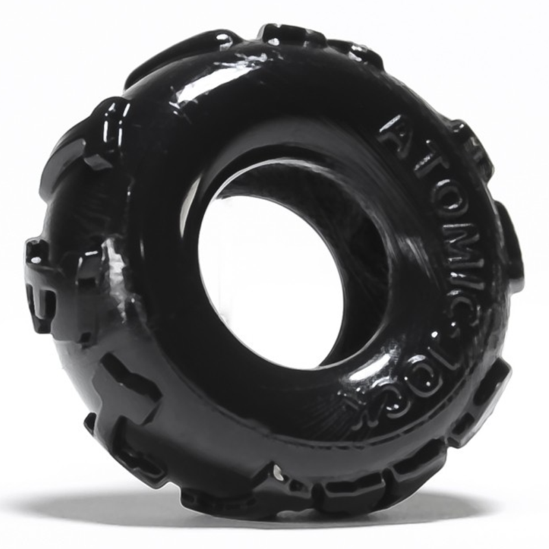 Black stretchy TPR cock ring with "ATOMIC JOCK" embossed on the side.