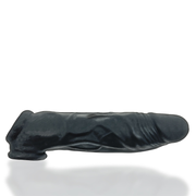 Black silicone cock sheath with textured surface and flared base.