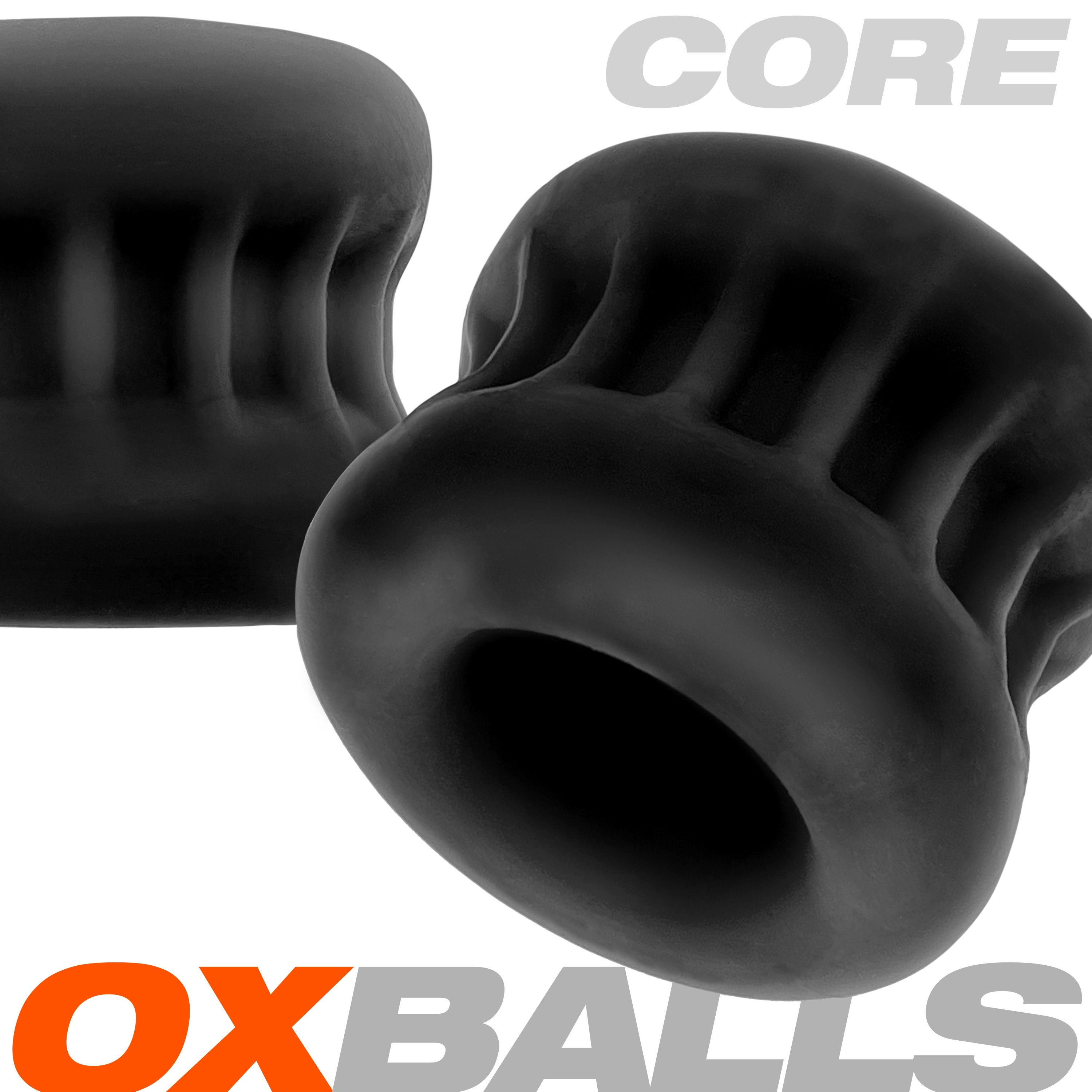 Black silicone ball stretcher with ribbed grip and hourglass shape.