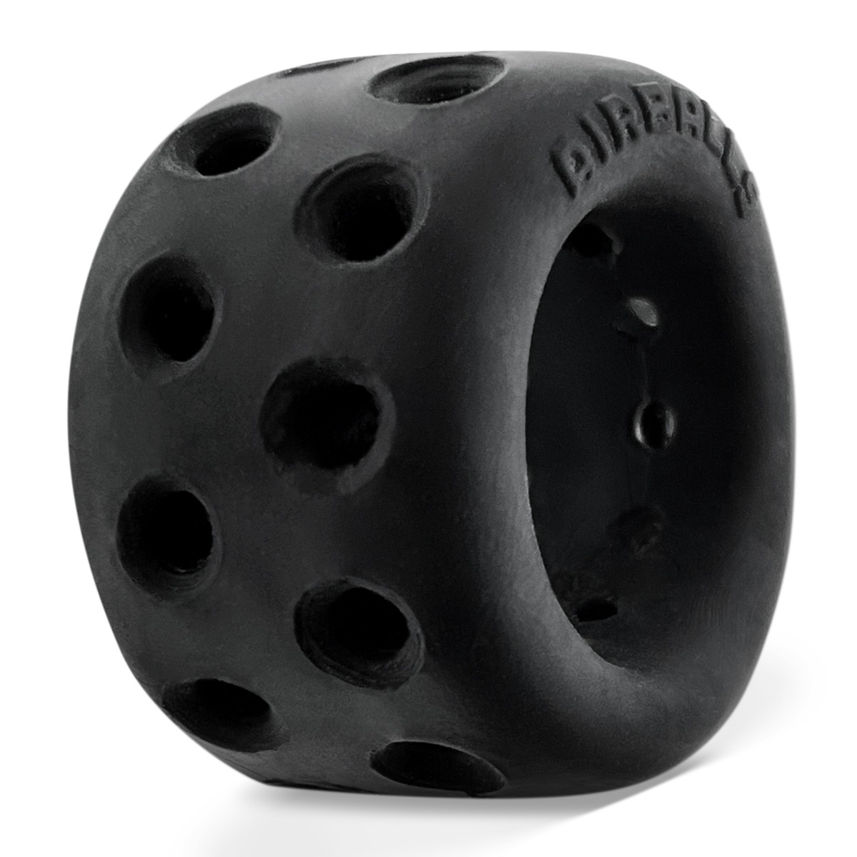 Black silicone ball stretcher with ventilation holes and embossed text.