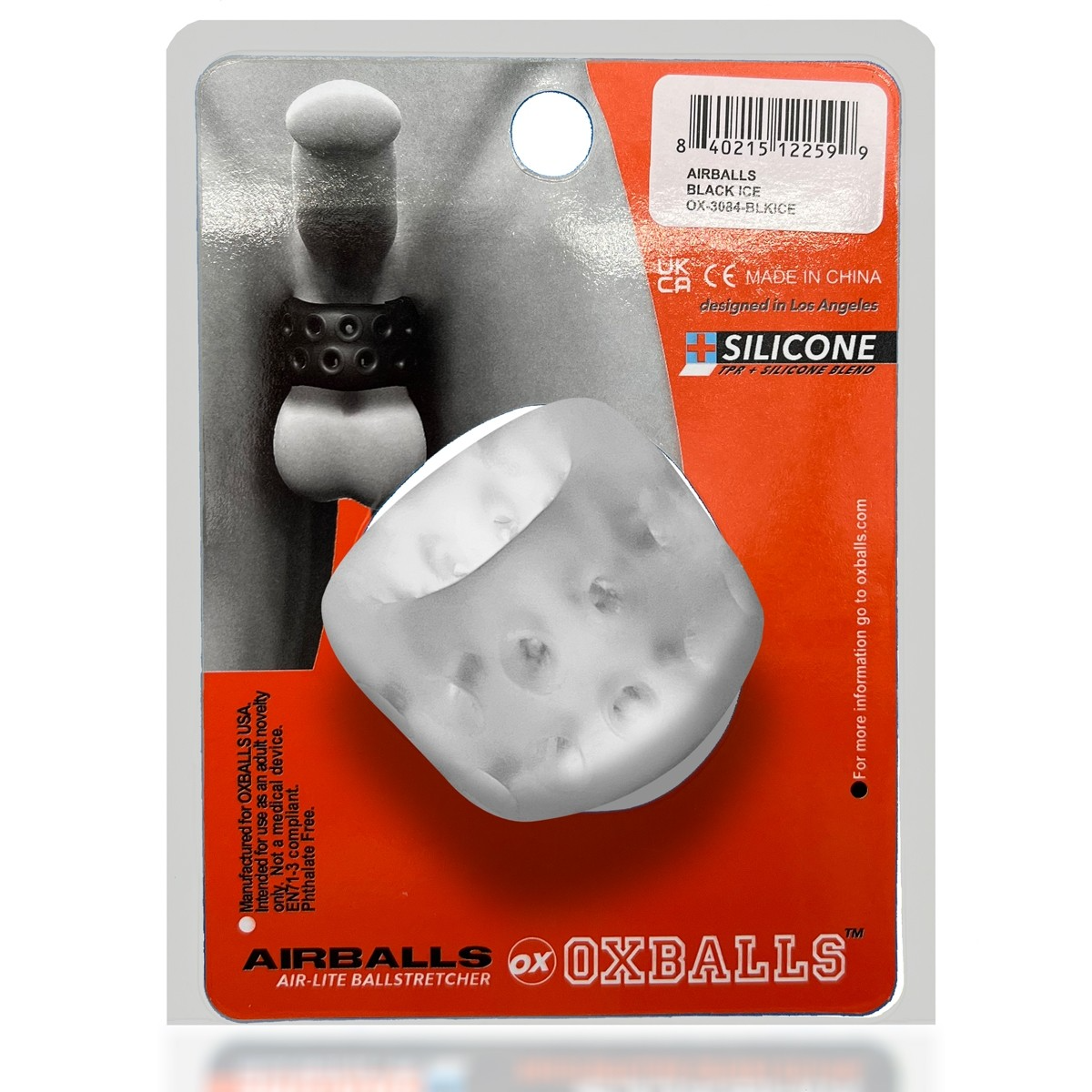 Clear ice silicone ball stretcher with textured surface in packaging.