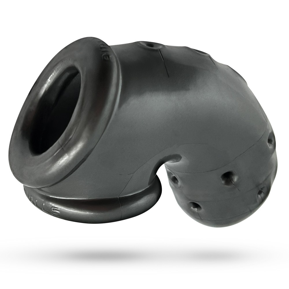 A black silicone chastity cage with ventilation holes and a wide opening.