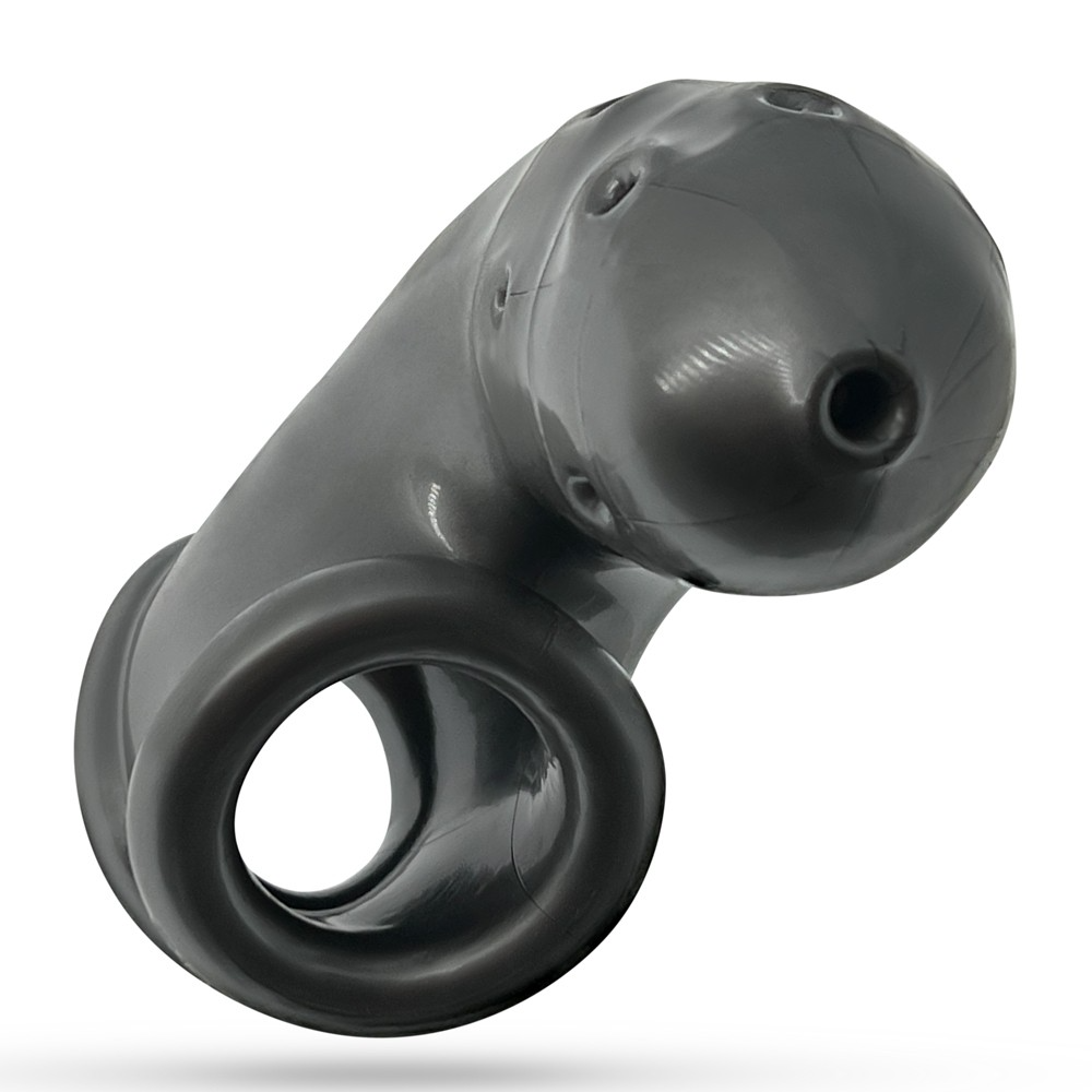 A grey silicone chastity cage with ventilation holes and a ring.