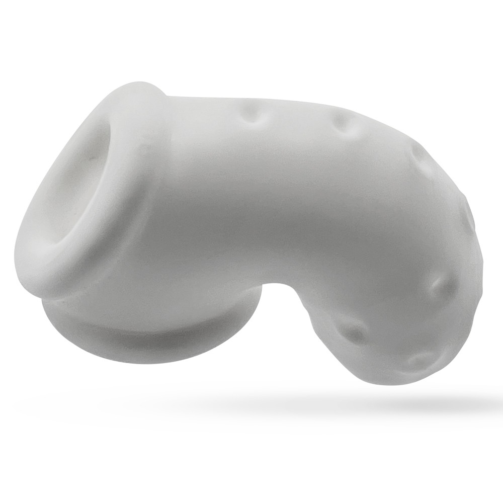 White silicone chastity cage with textured surface and ventilation holes.