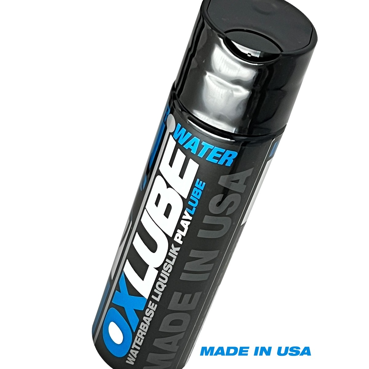 A black bottle of Oxballs water-based lubricant with blue and white text.