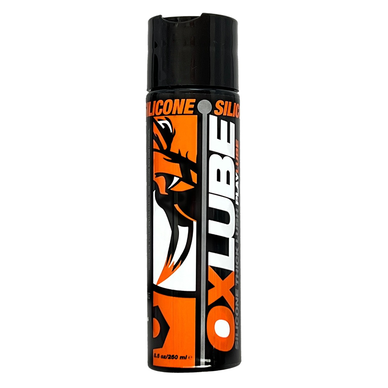 A bottle of OxLube thick silicone personal lubricant with an orange and black tiger design.