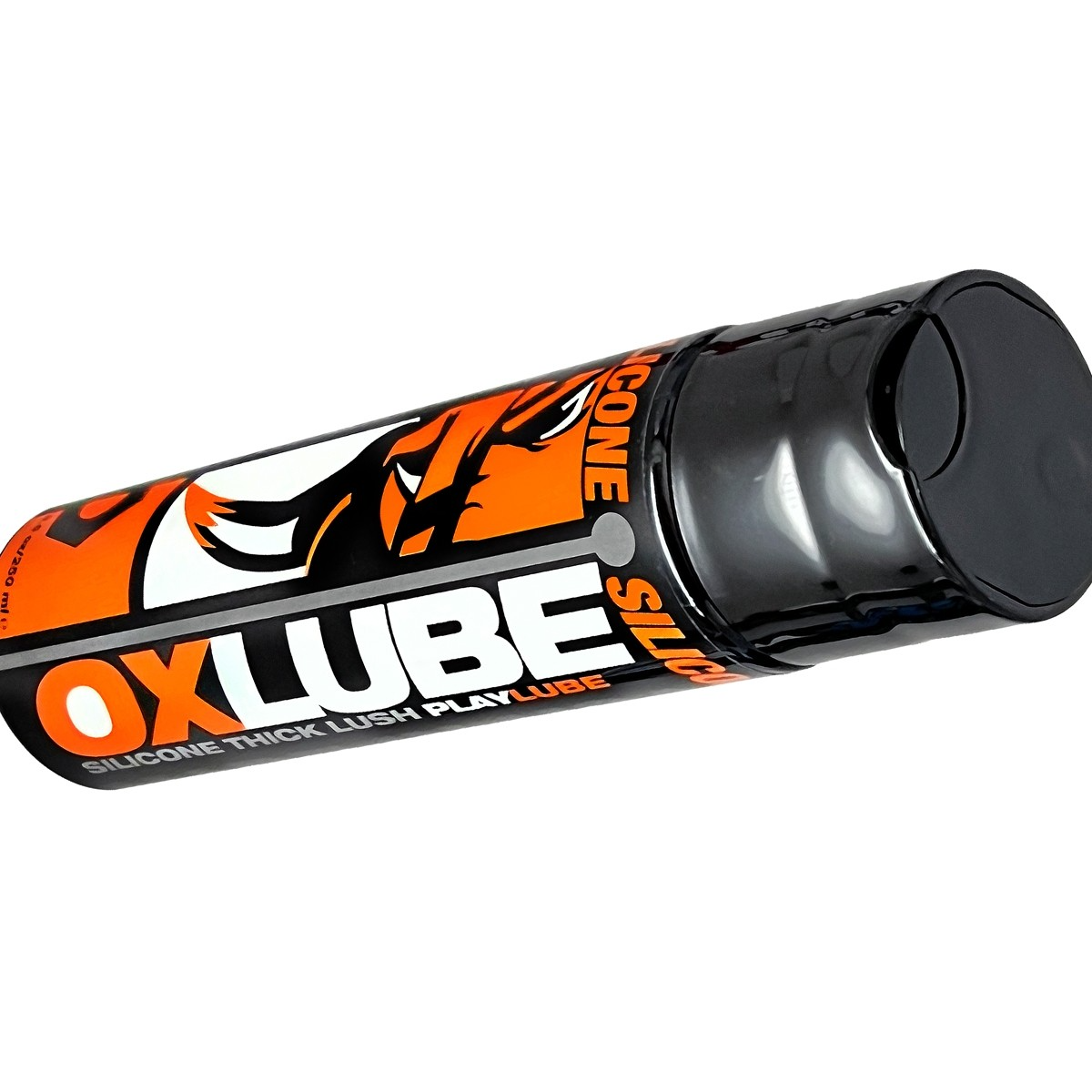 A bottle of OxLube thick silicone lubricant with an orange and black tiger design.