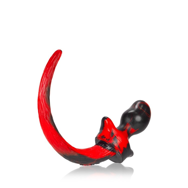Red and black swirl silicone puppy tail anal plug.