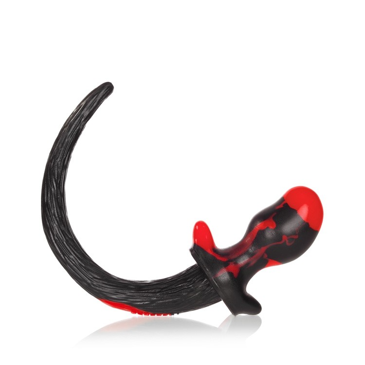 Red swirl silicone puppy tail anal plug with a curved tail.