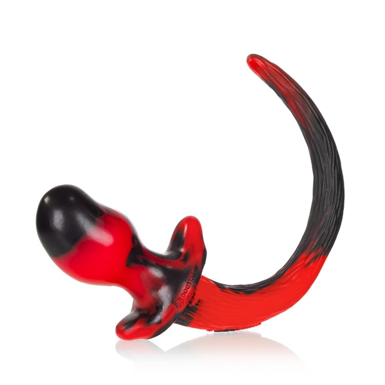 Red swirl silicone puppy tail anal plug with a kidney bean-shaped base.