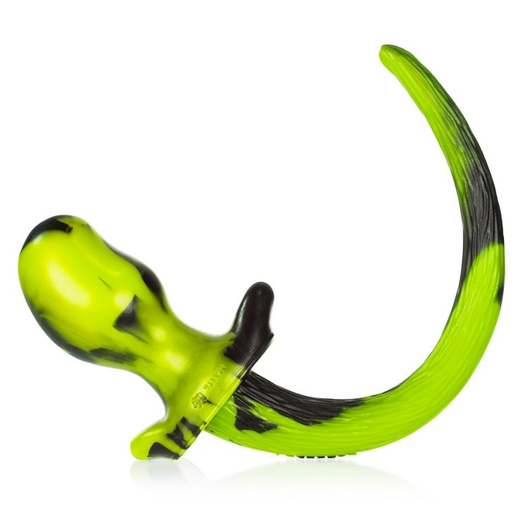A neon green and black swirled silicone puppy tail anal plug.