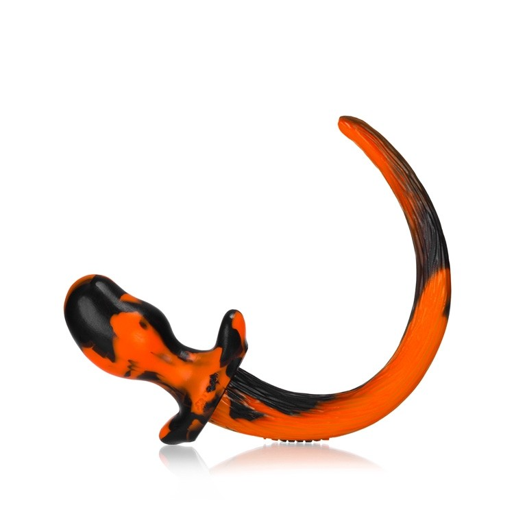 Orange and black swirl silicone puppy tail anal plug.