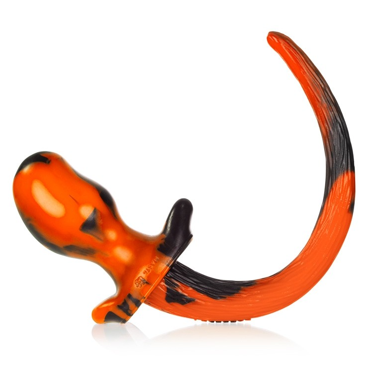 Orange swirl silicone puppy tail anal plug with black accents.