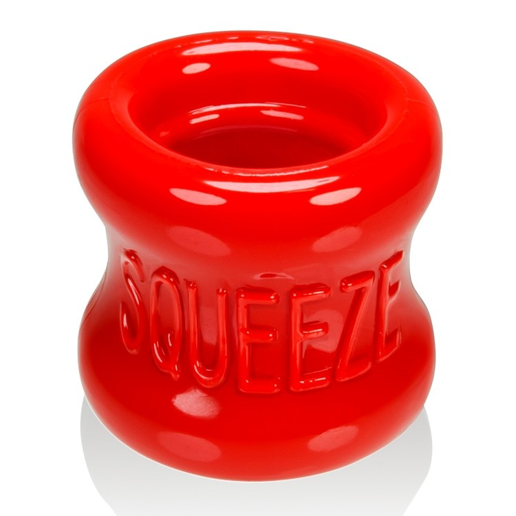 Red FLEXtpr ball stretcher with the word "Squeeze" embossed on it.