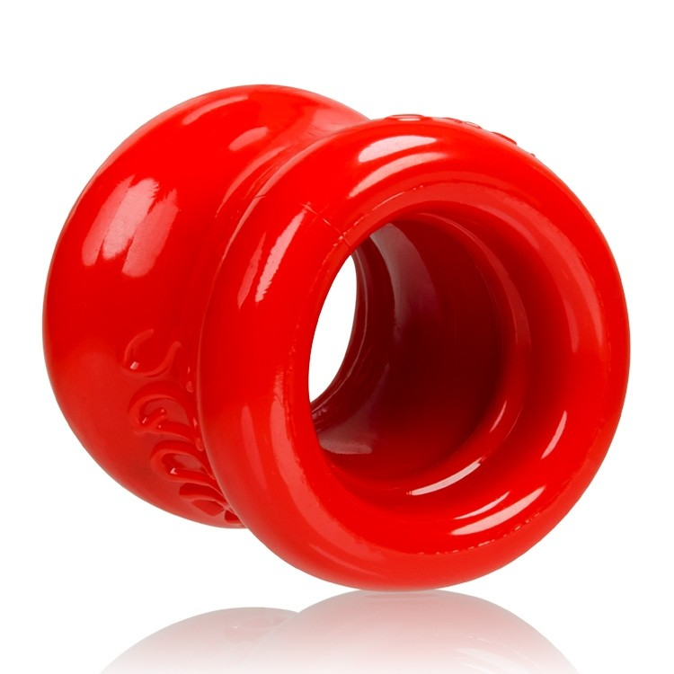 Red FLEXtpr ball stretcher with a smooth, rounded design.