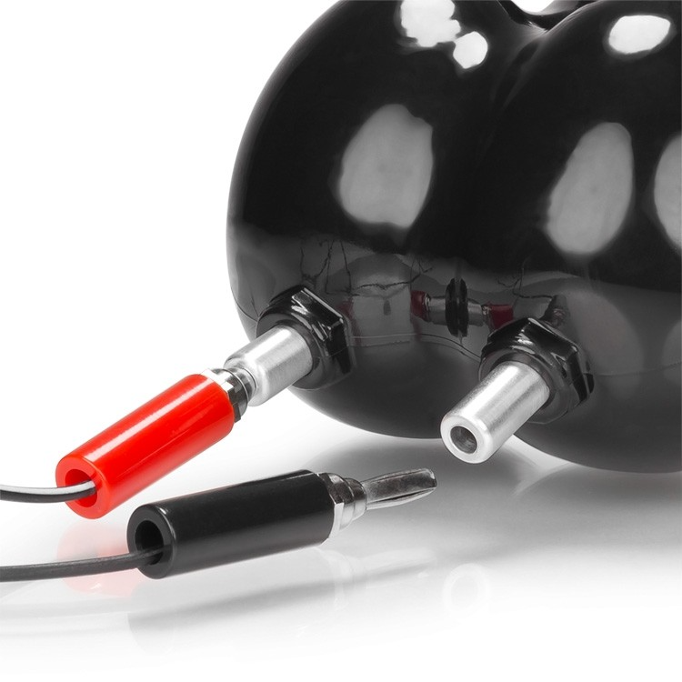 Black electro ball sack and cock sling with red and black connectors.