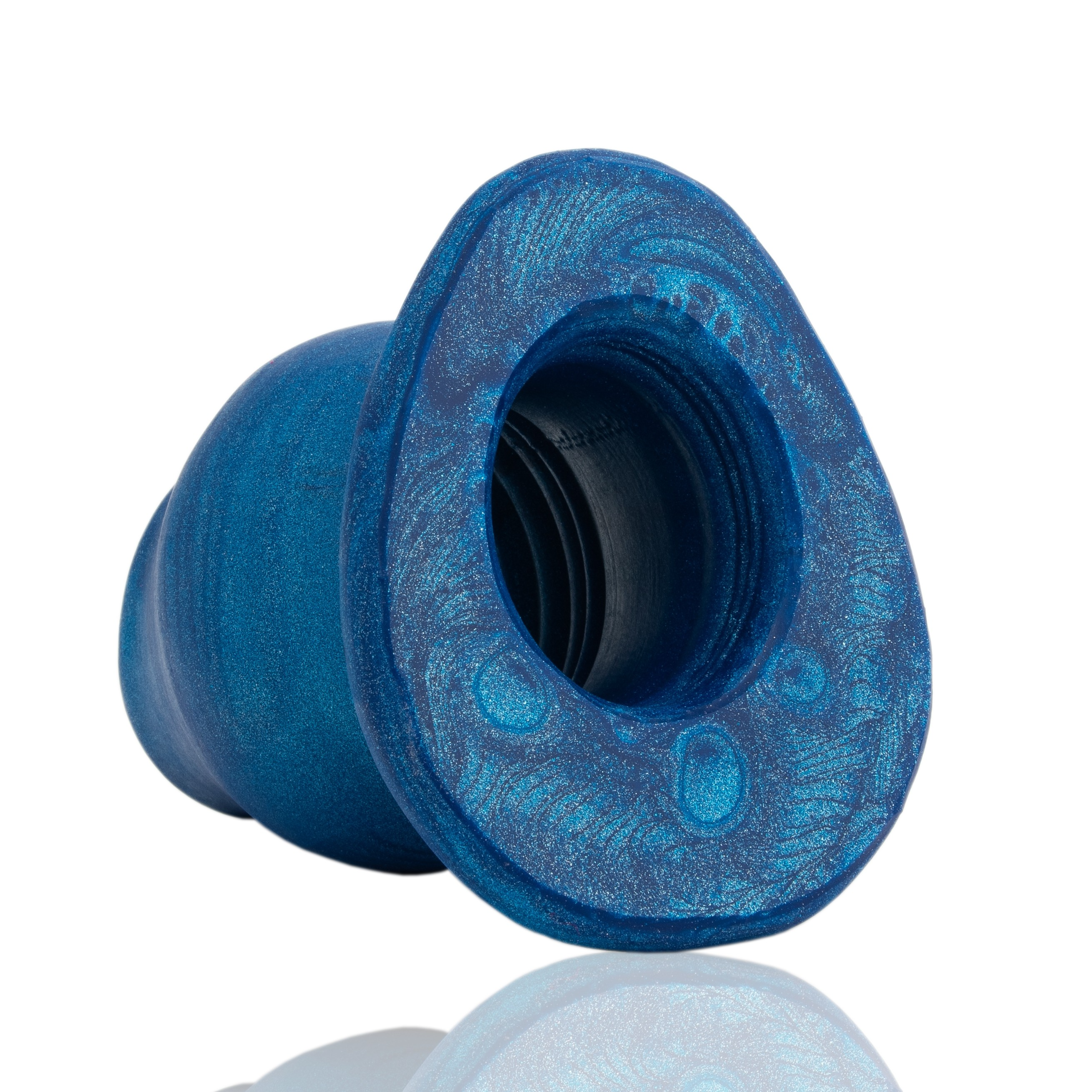 A blue, glittery, hollow silicone anal plug with a flared base.