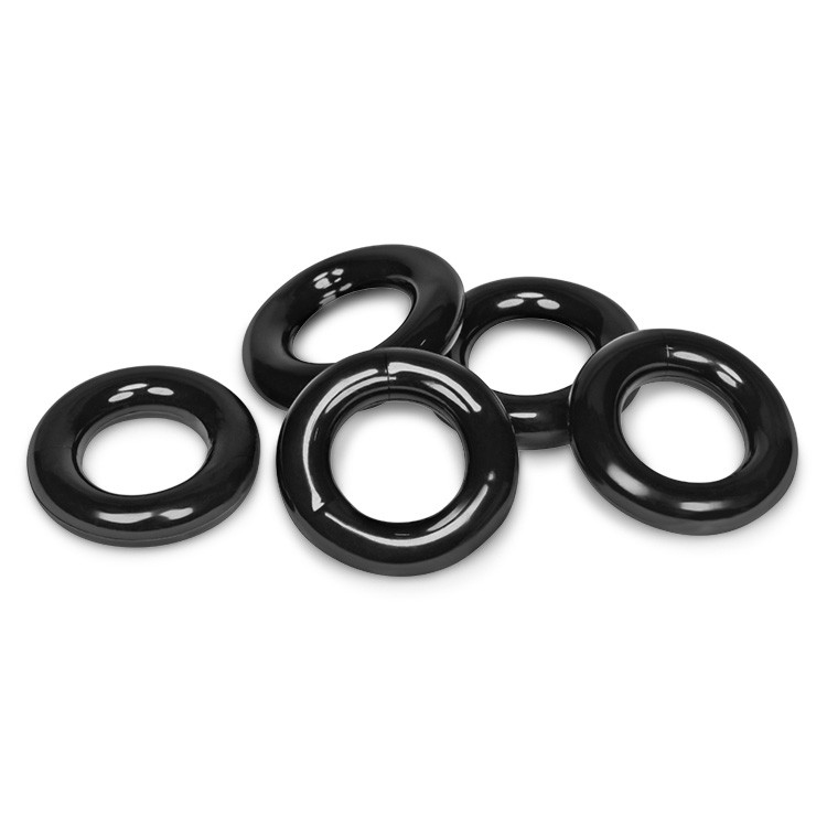 Five black stretchy jelly cock rings on a white background.