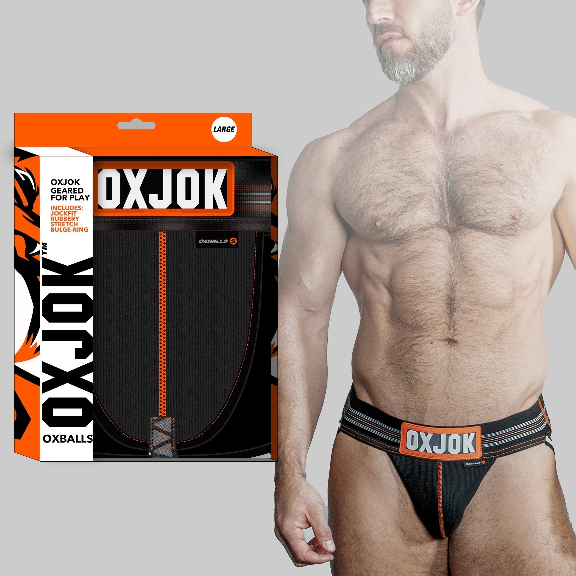 Black jockstrap with orange trim and a large "OXJOK" logo.
