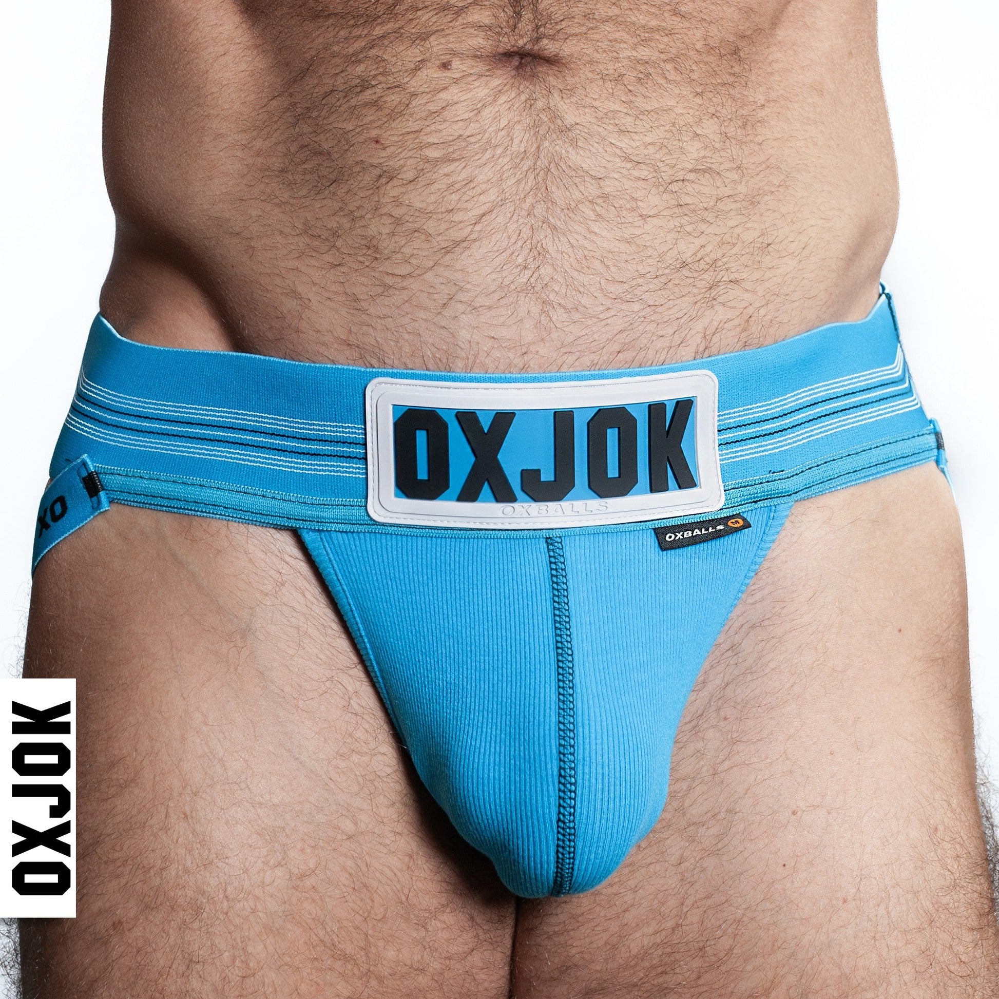 Blue jockstrap with a white and black logo patch.