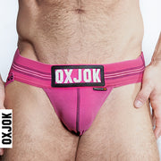 Pink Slingjock Slider-Strap jockstrap with cock ring.