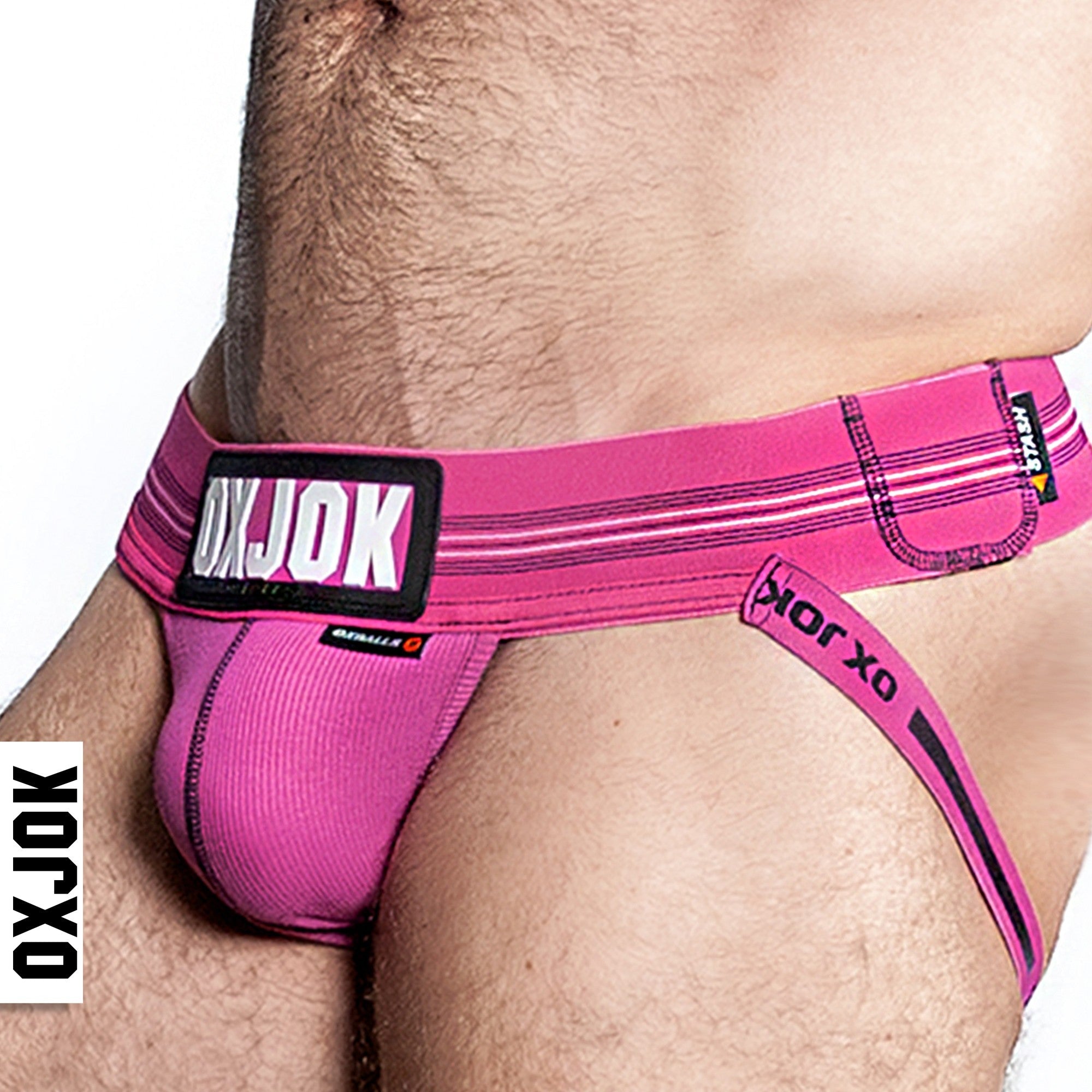 Pink jockstrap with "OXJOK" logo and striped waistband.